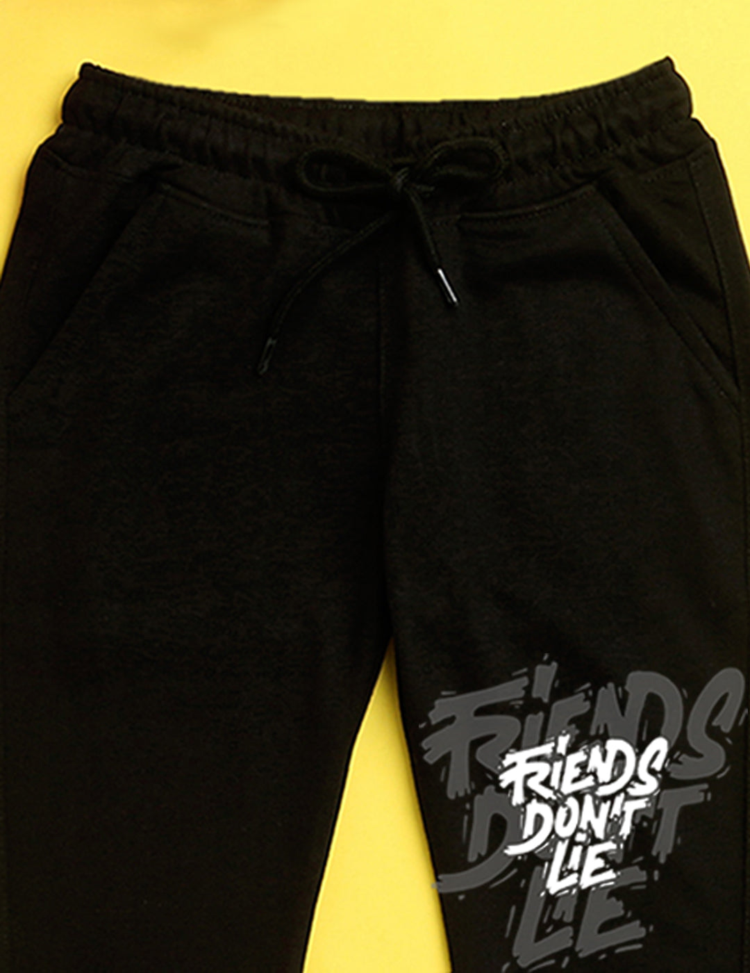 Black text printed kids unisex treck pants