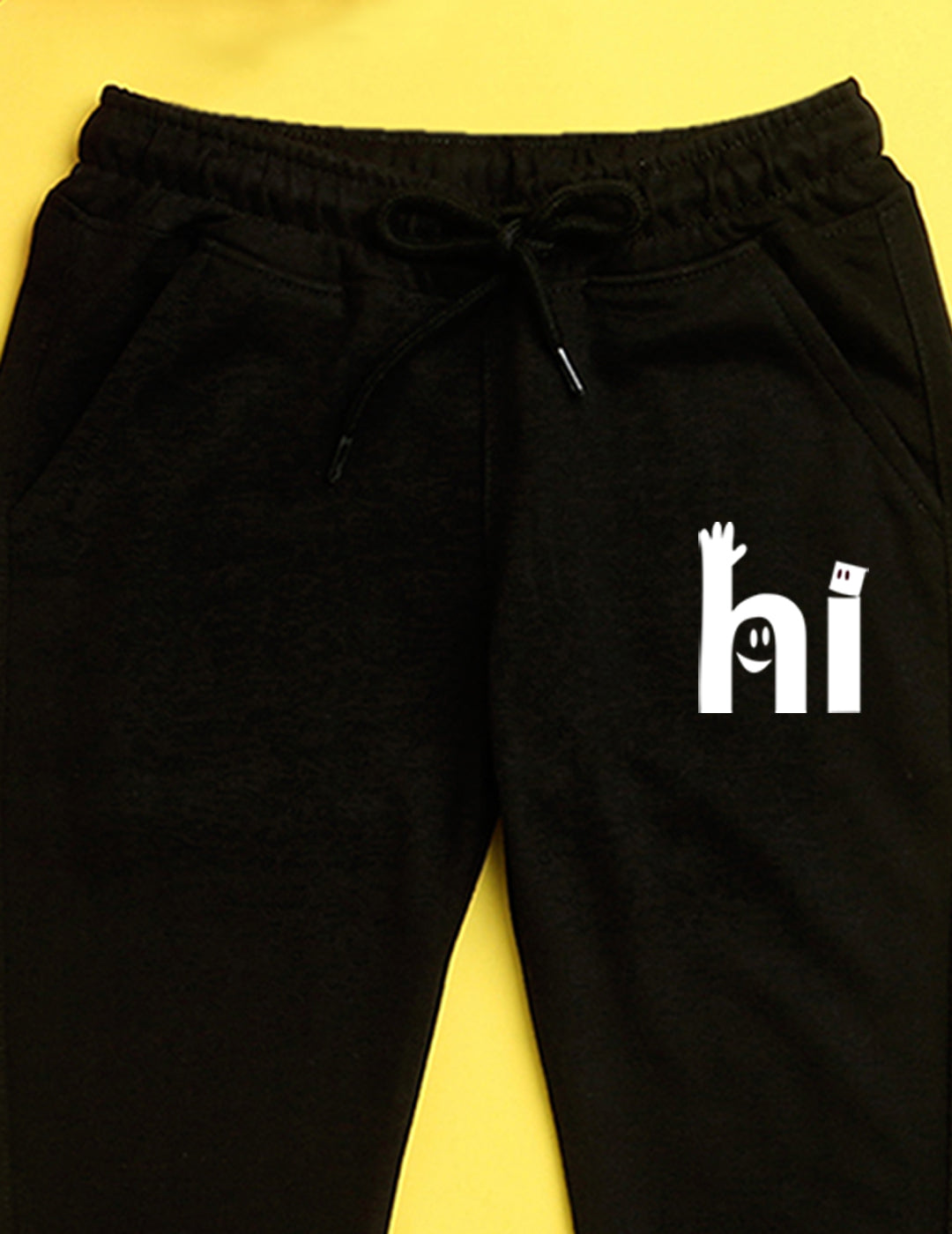 Nusyl Black text printed kids unisex treck pants