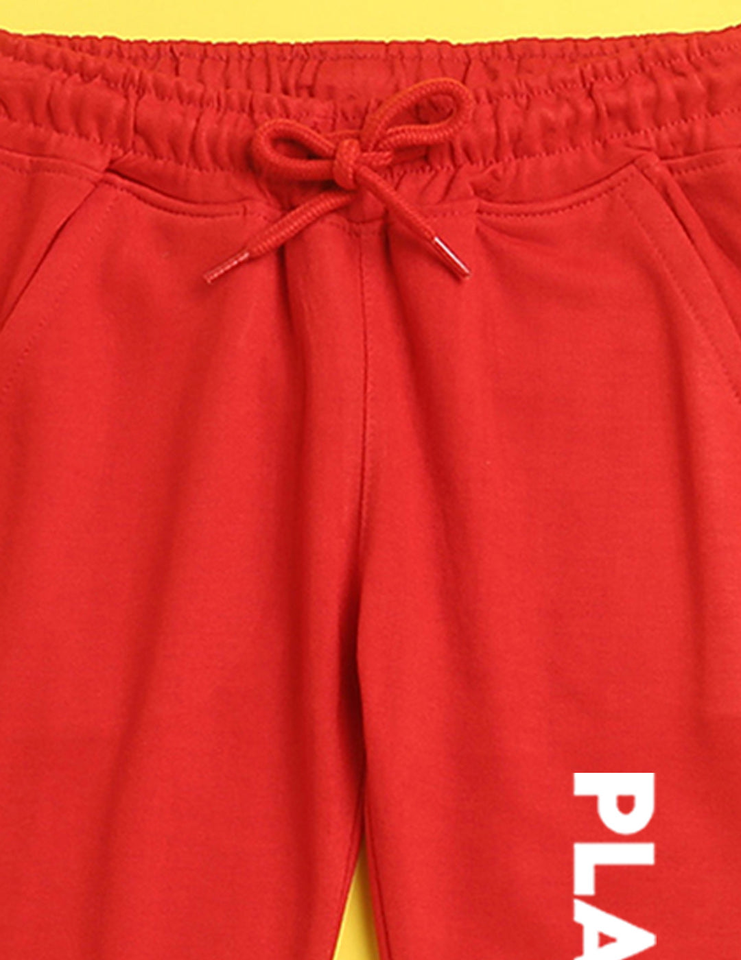 Nusyl Red text printed kids unisex treck pants