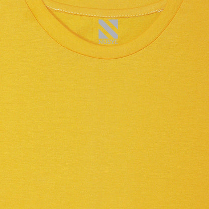 a close up of a nusyl yellow short sleeve t shirt with nusyl logo