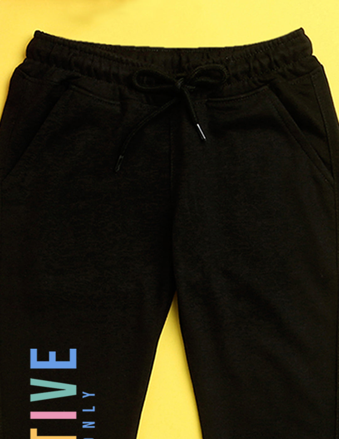 Nusyl Black text printed kids unisex treck pants