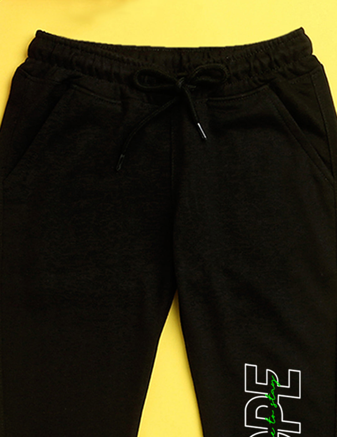 Nusyl Black text printed kids unisex treck pants